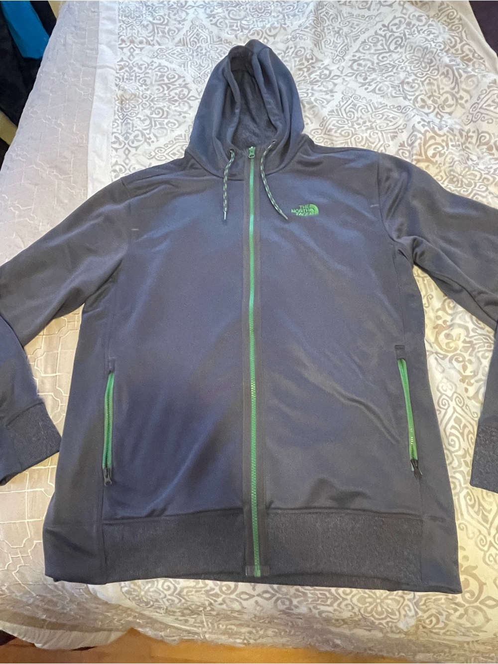 The North Face Men’s Navy Blue Hoodie Jacket with Green Zippers